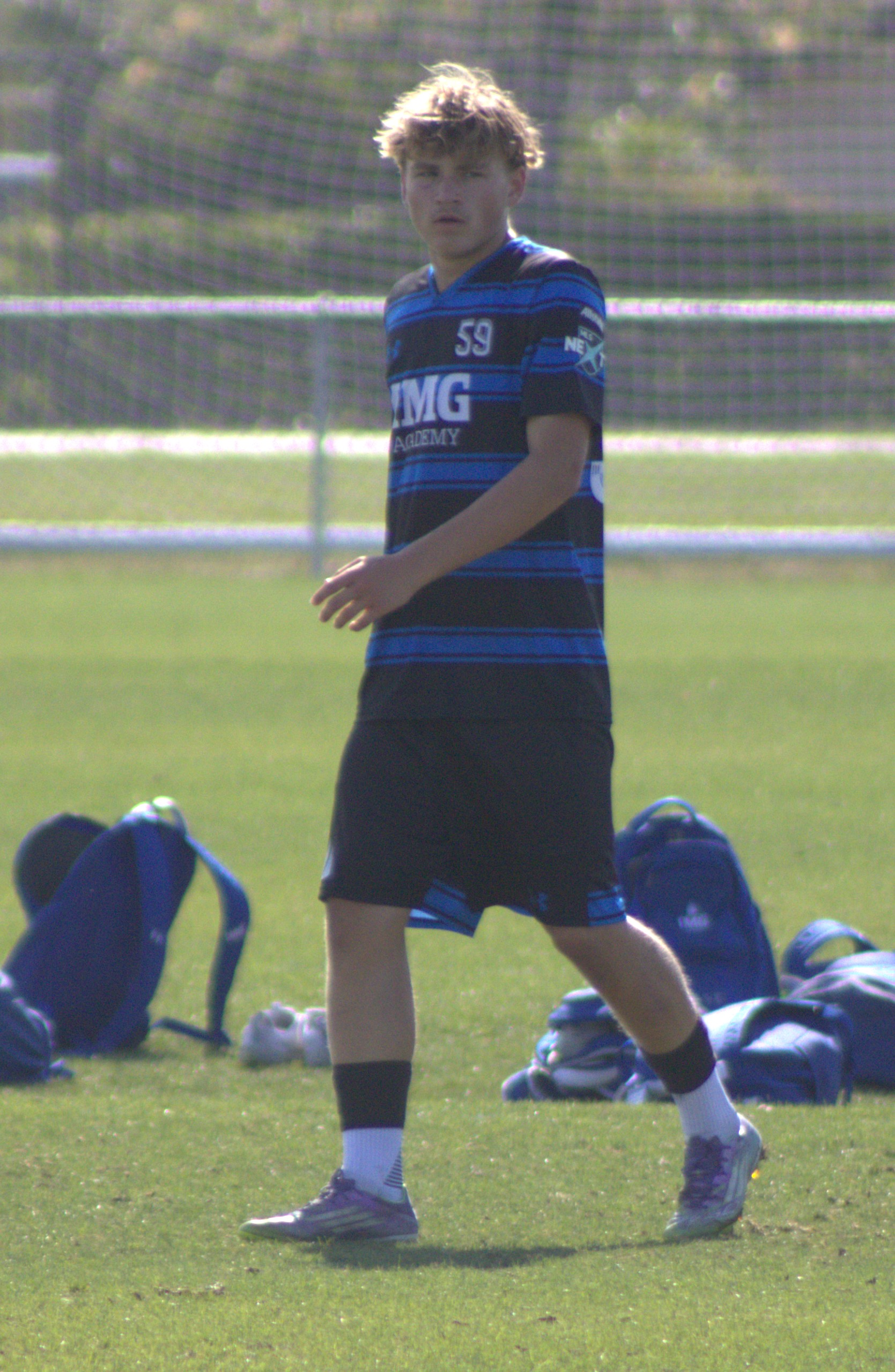 Tyler Tirch wearing number 59 for IMG Academy